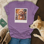 Purple t-shirt with a polaroid of a dog wearing glasses and a scarf.