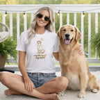 Woman wearing white t-shirt with dog graphic and text "my therapist says WOOF" next to golden retriever.