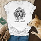 White t-shirt with black doodle dog graphic and text "doodle what?".