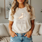 Beige t-shirt with a dachshund graphic and text "FALLING FUR FALL".