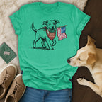 Dog wearing bandana with American flag, on a t-shirt.
