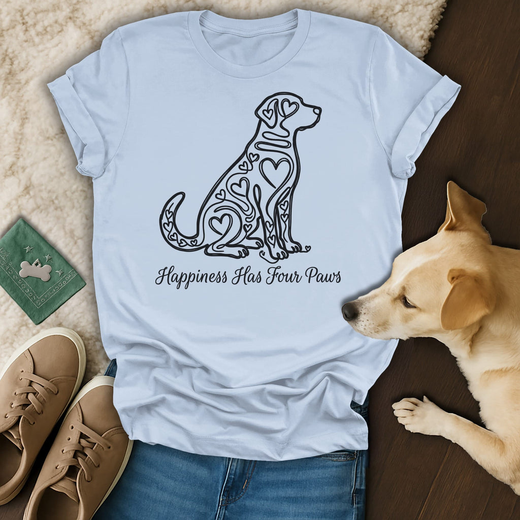 Light blue t-shirt with a black heart-filled dog design and text "Happiness Has Four Paws."