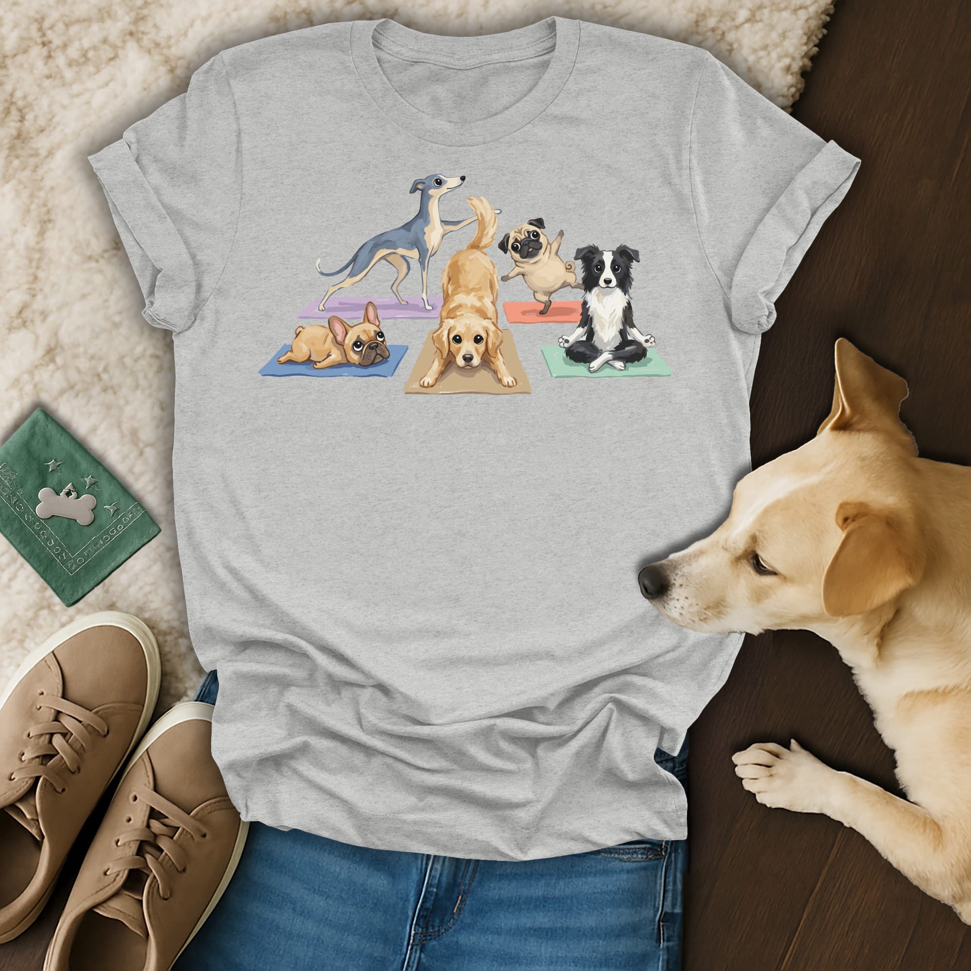 Dogs in yoga poses on mats on a grey t-shirt.