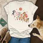 Cream t-shirt with a graphic print featuring a line of dogs on roller skates under a disco ball.