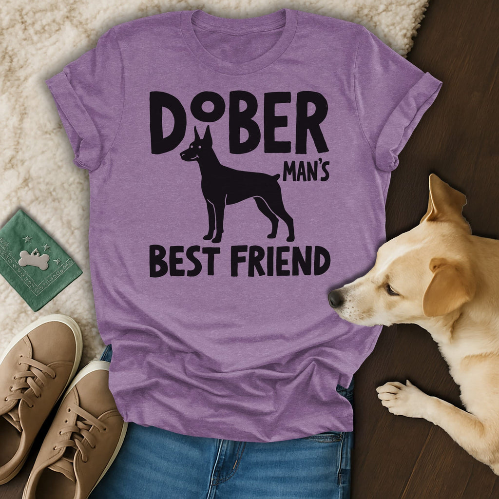 Doberman Pinscher dog silhouette on purple t-shirt with "Doberman Man's Best Friend" text.