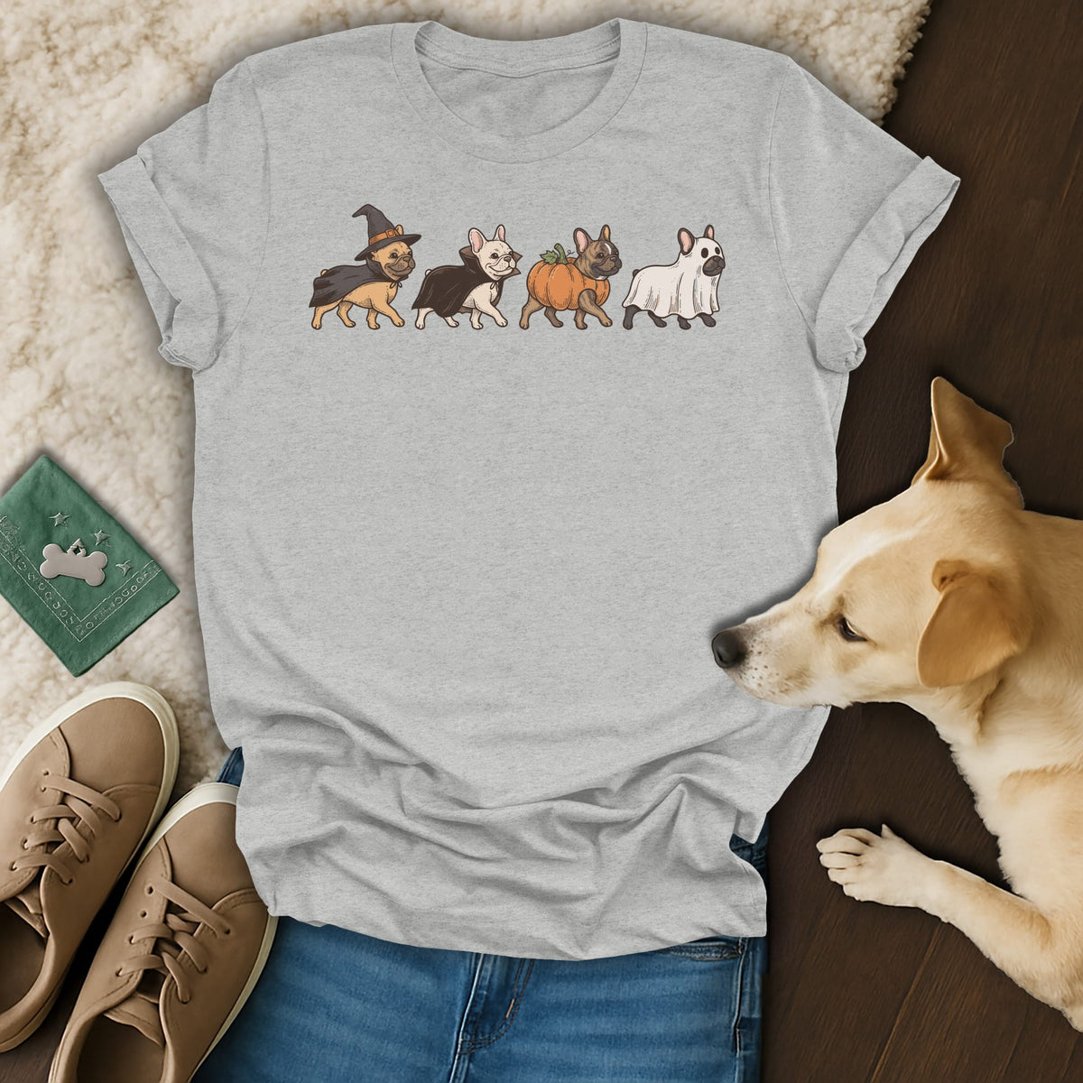 Grey t-shirt with illustration of four French bulldogs in Halloween costumes.
