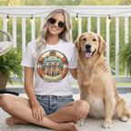 Woman and golden retriever sit on a porch wearing a "My Cruise Shirt" t-shirt.
