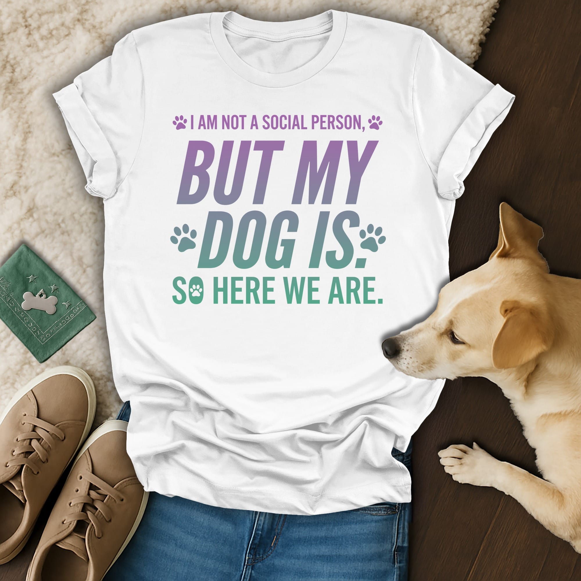 White t-shirt with purple and green text "I AM NOT A SOCIAL PERSON, BUT MY DOG IS SO HERE WE ARE."