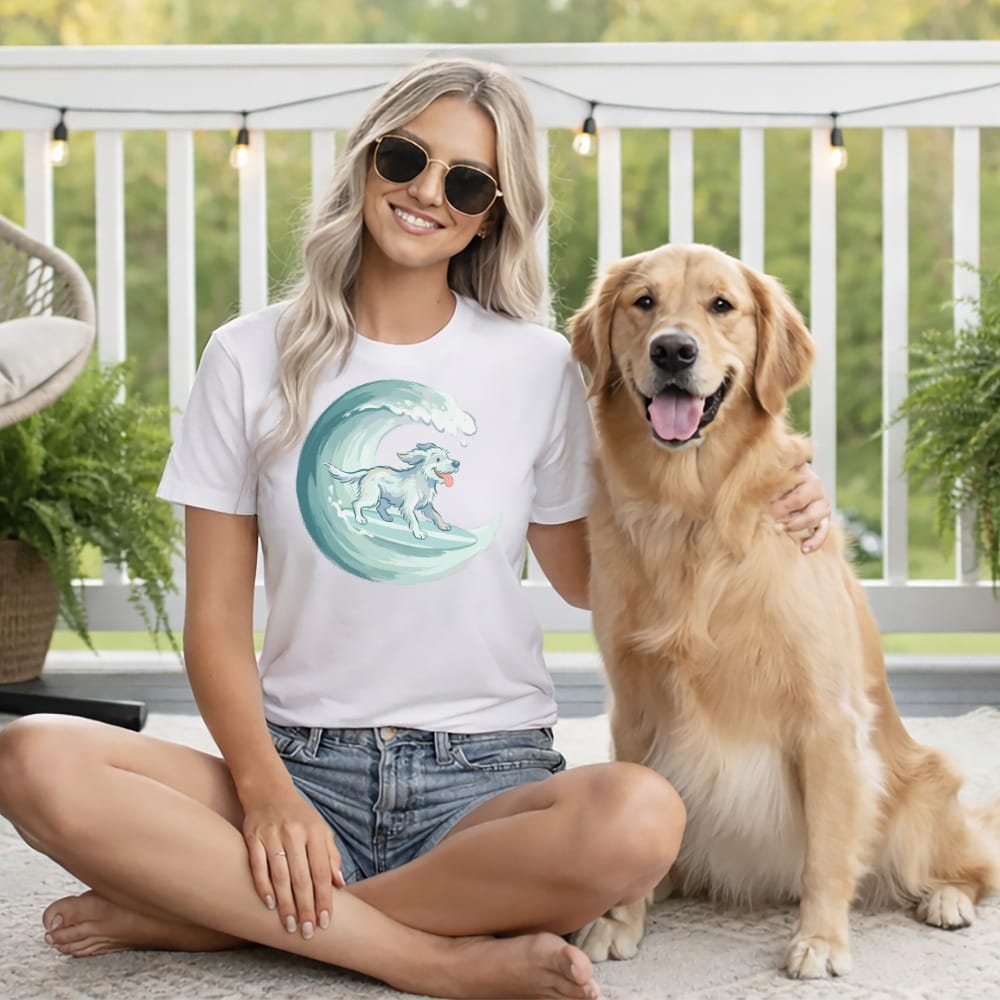 Woman and golden retriever on deck, woman wearing white t-shirt with surfing dog graphic.