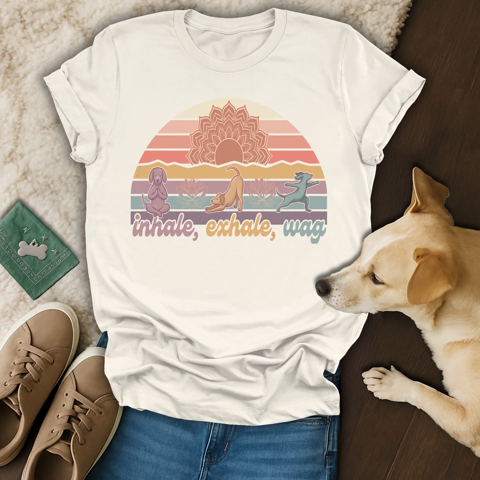 T-shirt with sunset graphic and yoga dogs saying "inhale, exhale, wag."