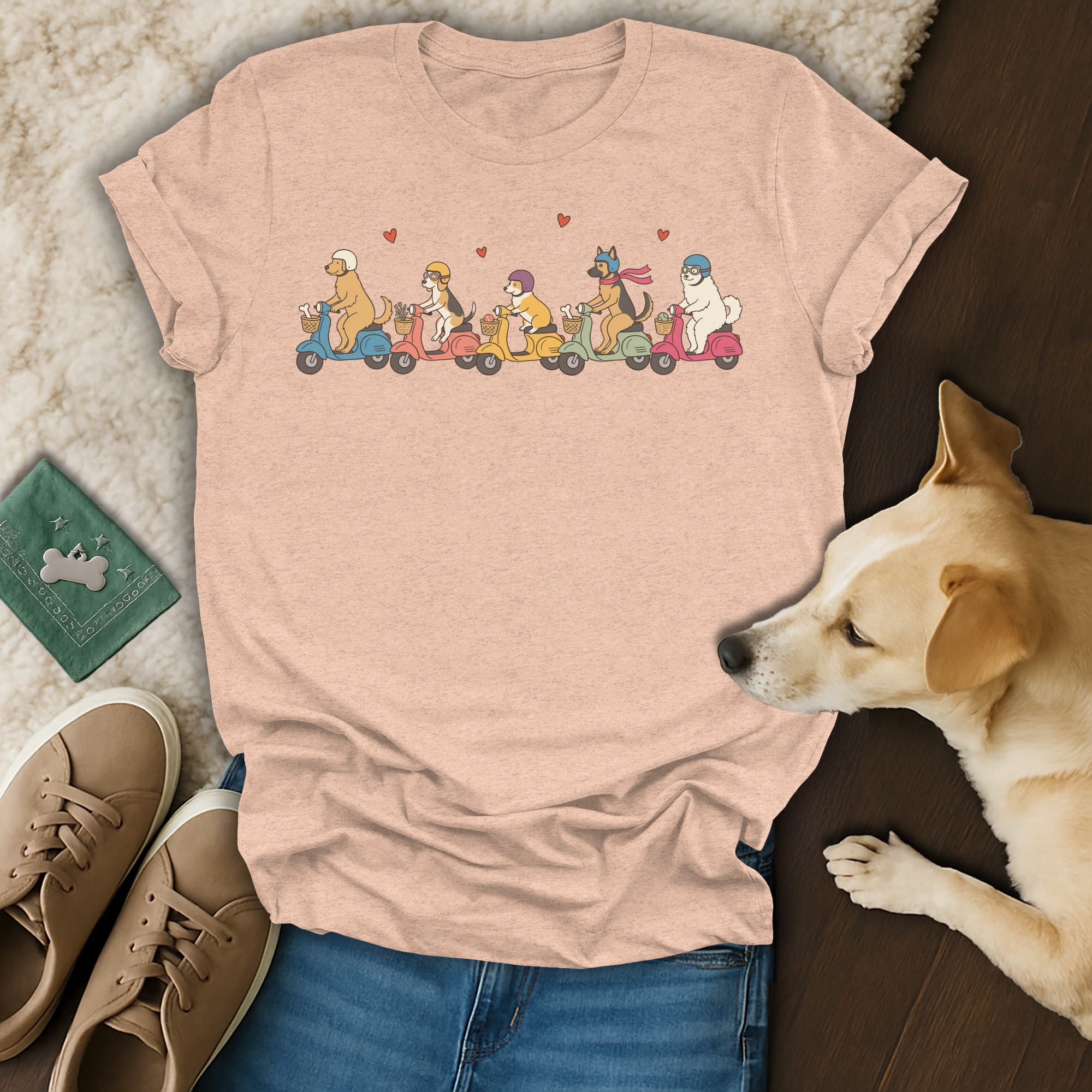 T-shirt with a cartoon of dogs riding scooters, wearing helmets, with hearts.