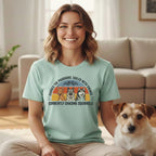 Light blue t-shirt with dogs guarding pharaohs and text "Currently Chasing Squirrels".