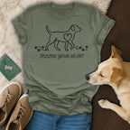 Olive green t-shirt with dog outline, heart, and paw prints.