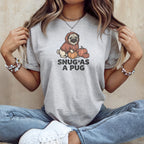 Grey t-shirt with a pug wearing a hoodie and pumpkins, text "Snug As A Pug".