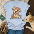 Light blue t-shirt featuring a pit bull graphic with flowers and the text Crowned in Kindness.