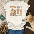Cream t-shirt with four dogs and "Every day is better with dogs" text.