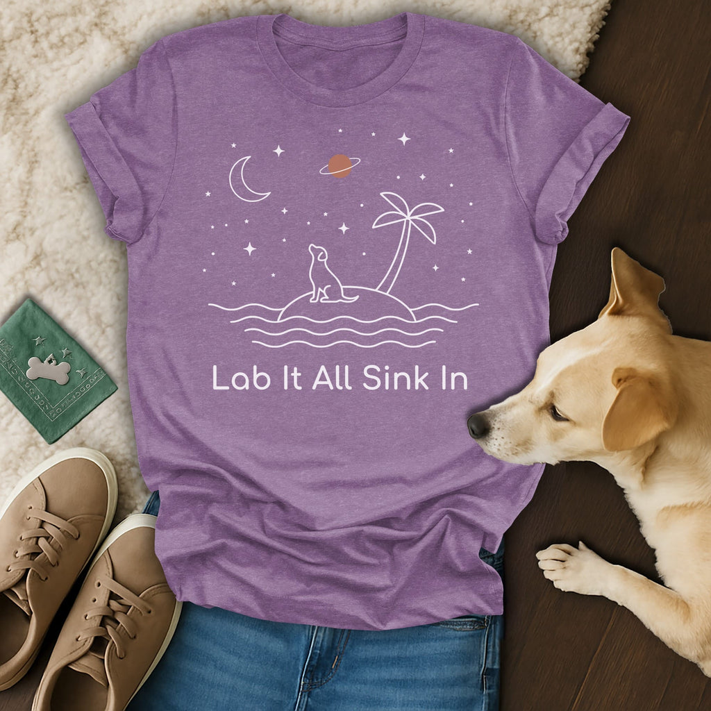 Purple t-shirt with dog on island graphic, "Lab It All Sink In" text.