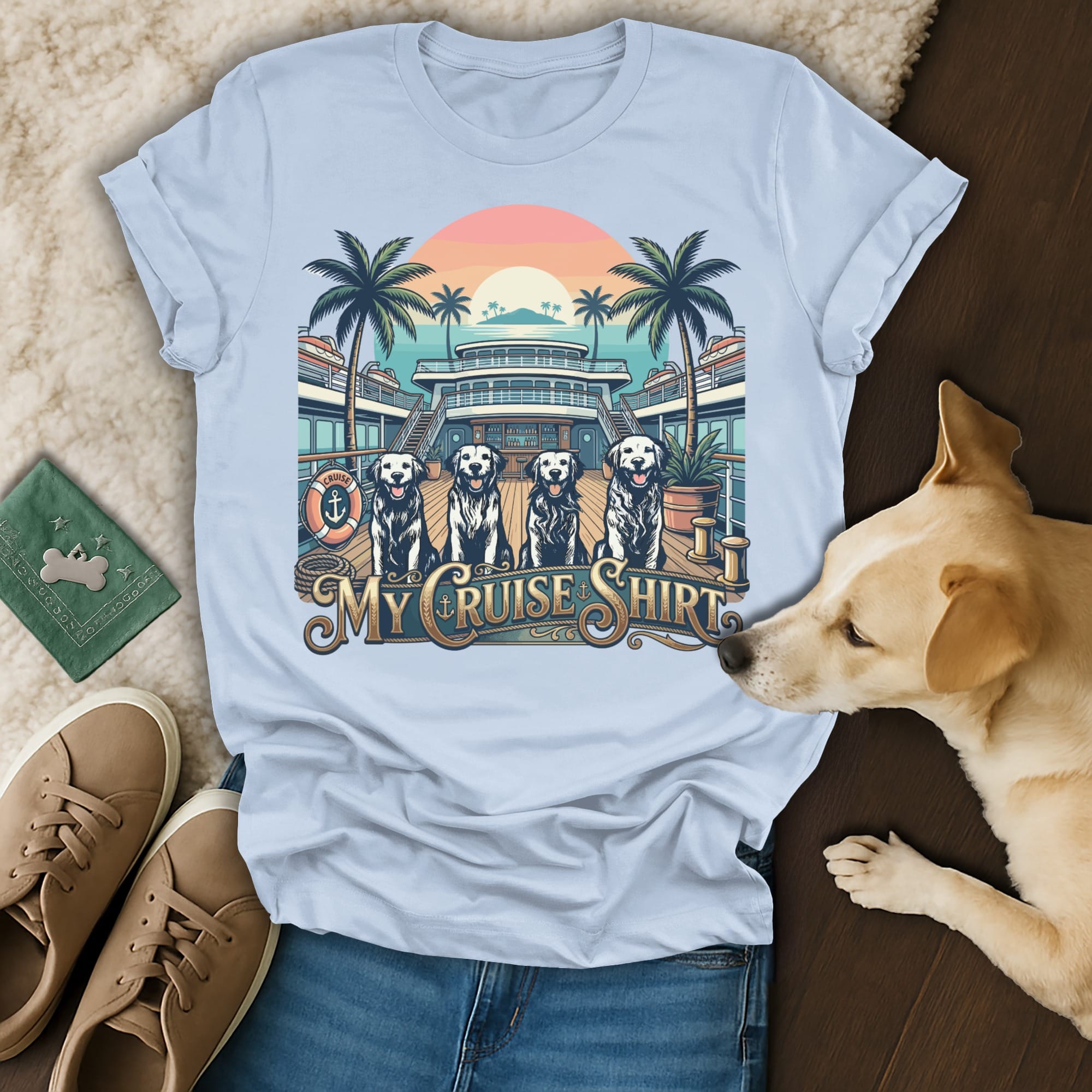 Light blue t-shirt with four dogs on a cruise ship deck with palm trees.