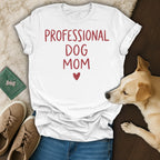 White t-shirt with red text "PROFESSIONAL DOG MOM" and a heart.
