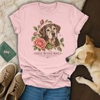 Light pink t-shirt featuring a vintage botanical graphic of a senior dog and roses.