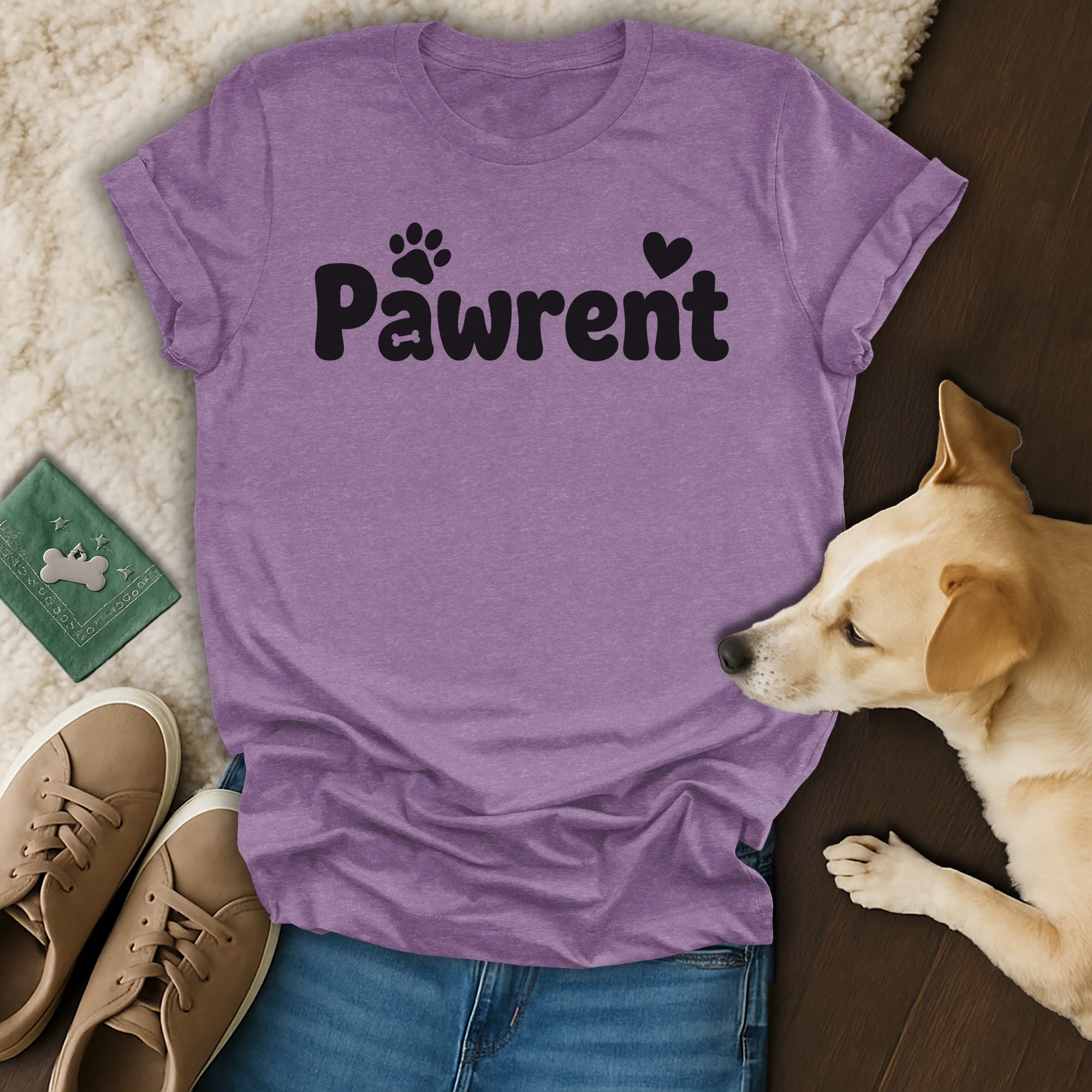 Purple t-shirt with "Pawrent" text and paw print, next to dog and shoes.