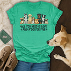 T-shirt with dogs and text "All you need is love and a dog".