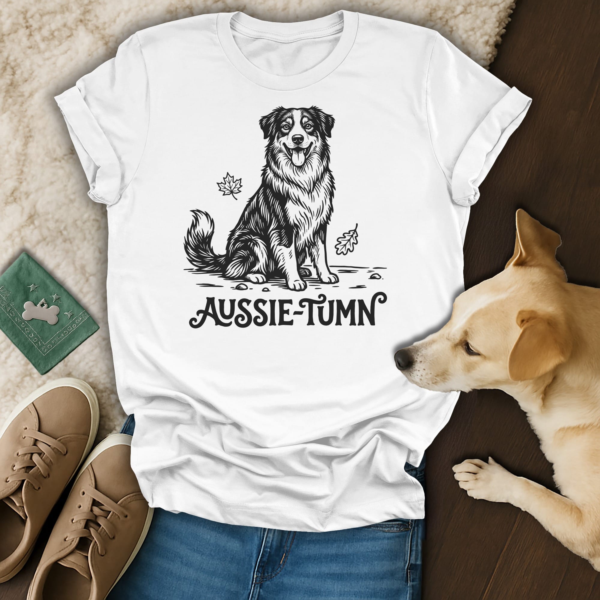 White t-shirt with black line drawing of an Australian Shepherd and "Aussie-Tumn" text.