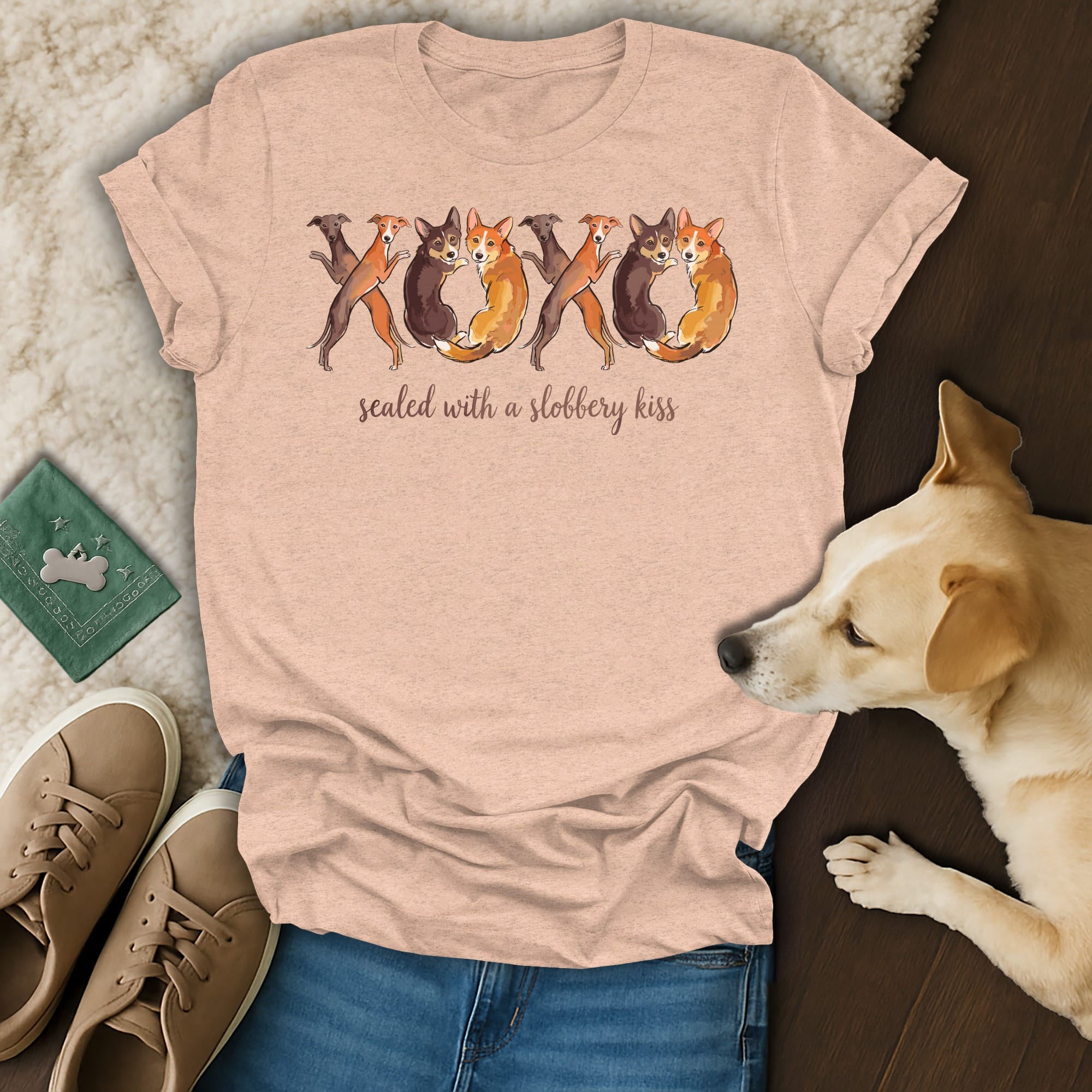 T-shirt with watercolor dogs forming XOXO and "sealed with a slobbery kiss" text.
