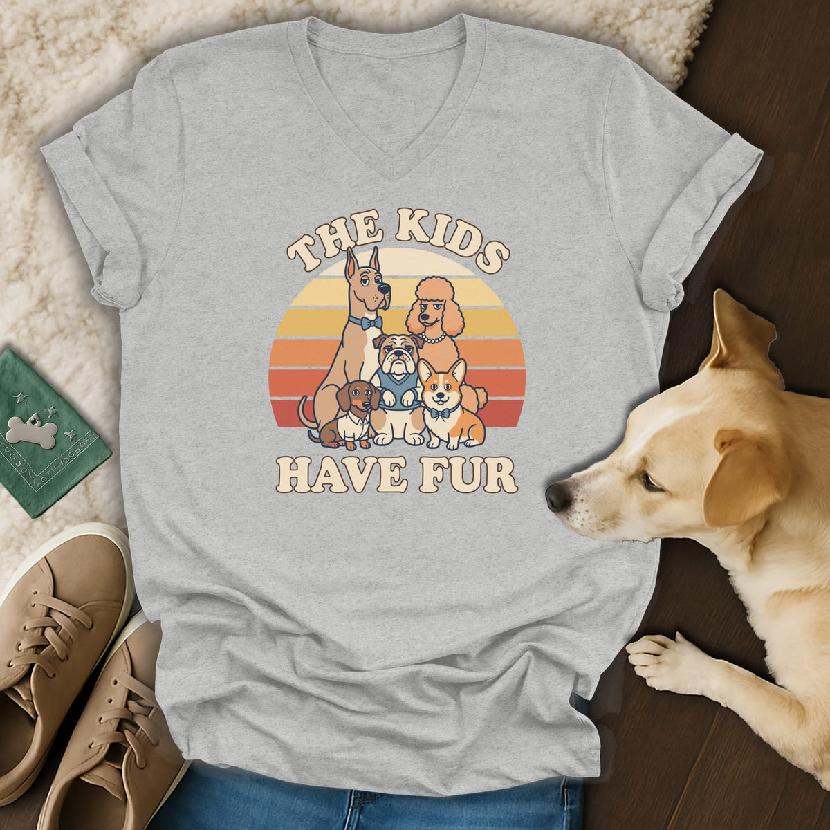 Grey t-shirt with cartoon dogs and text "THE KIDS HAVE FUR".