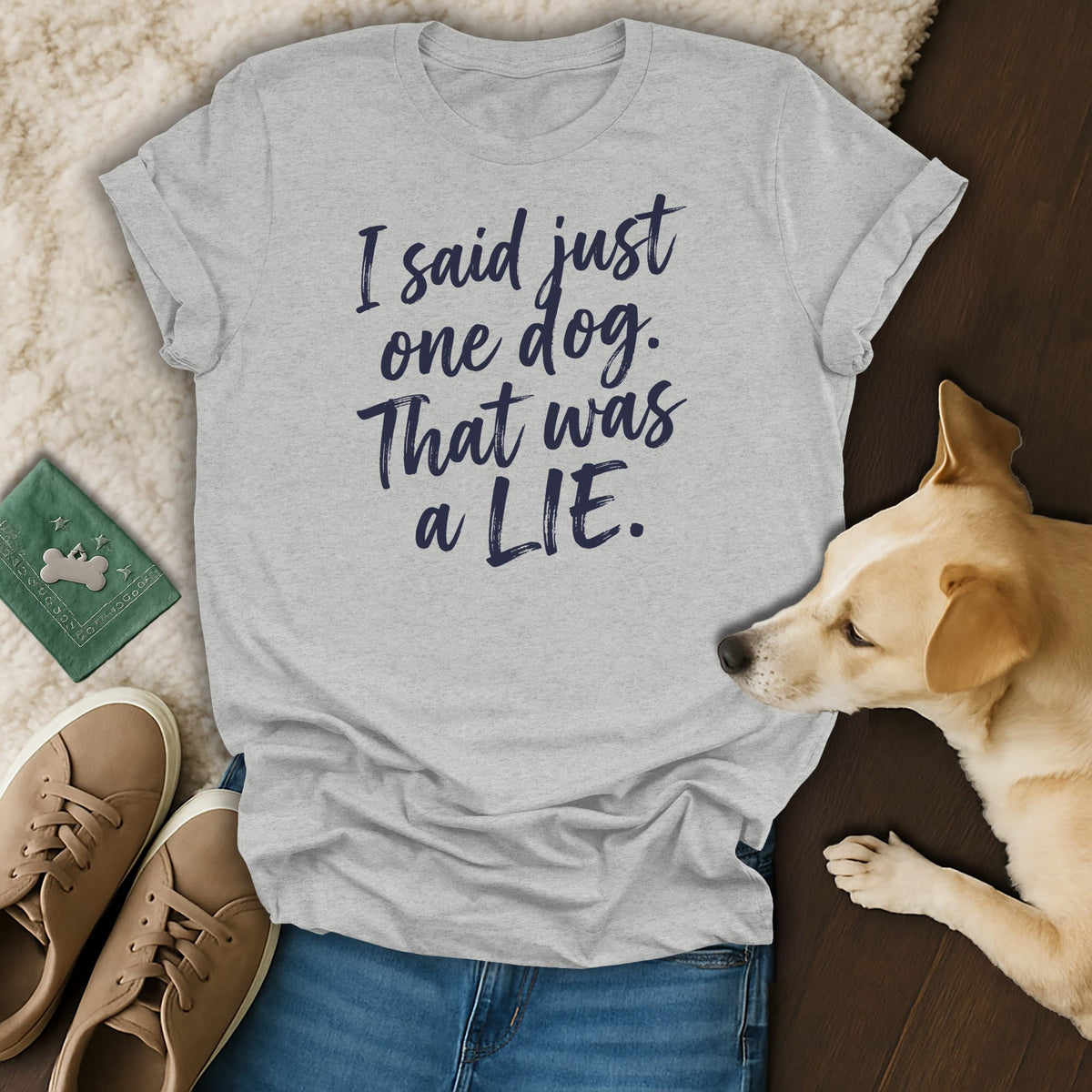 Light grey t-shirt with navy text reading "I said just one dog. That was a LIE."