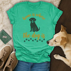Teal t-shirt with "Home is where the dog is" and paw prints.