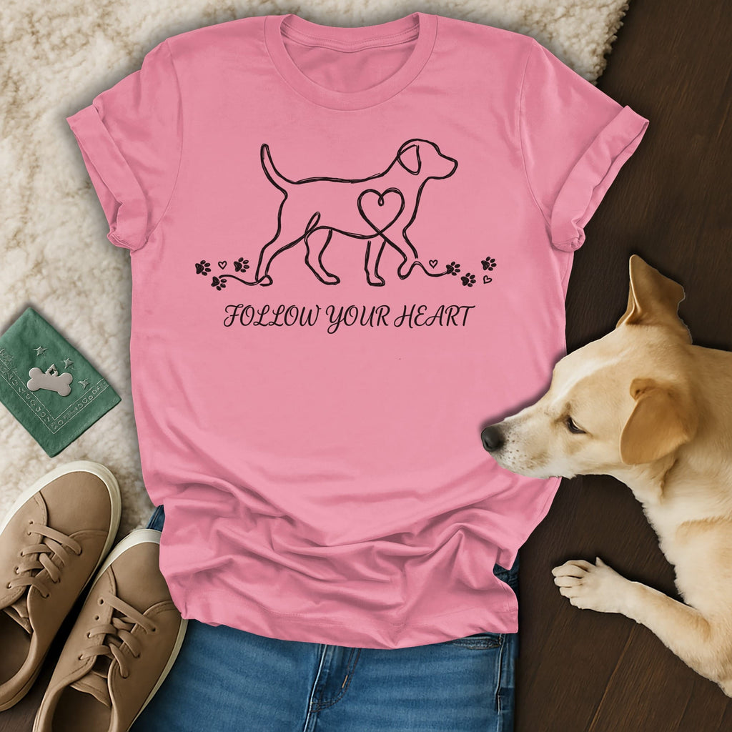 Pink t-shirt with dog outline, heart, paw prints, and "Follow Your Heart" text.