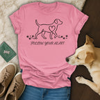 Pink t-shirt with dog outline, heart, paw prints, and "Follow Your Heart" text.