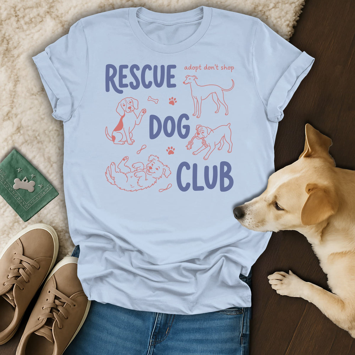 Light blue t-shirt with "RESCUE DOG CLUB adopt don't shop" and dog illustrations.