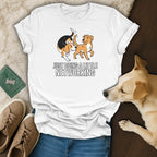 White t-shirt with cartoon dogs and text "JUST DOING A LITTLE NETWORKING".