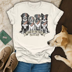 T-shirt with four dogs wearing bandanas and sunglasses, "Land of the Free" text.