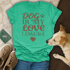Green t-shirt with "Dog is my love language" text and heart graphic.