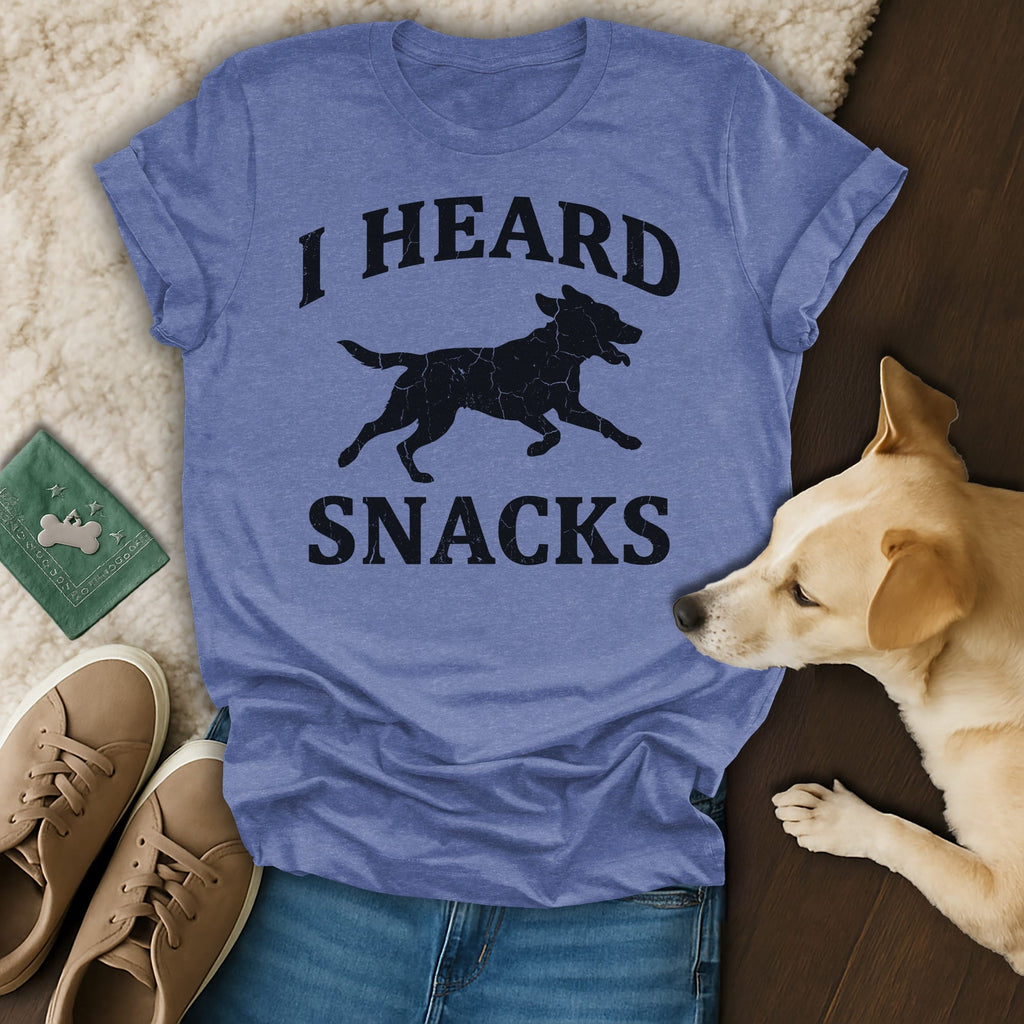 T-shirt with black silhouette of dog and text "I HEARD SNACKS".