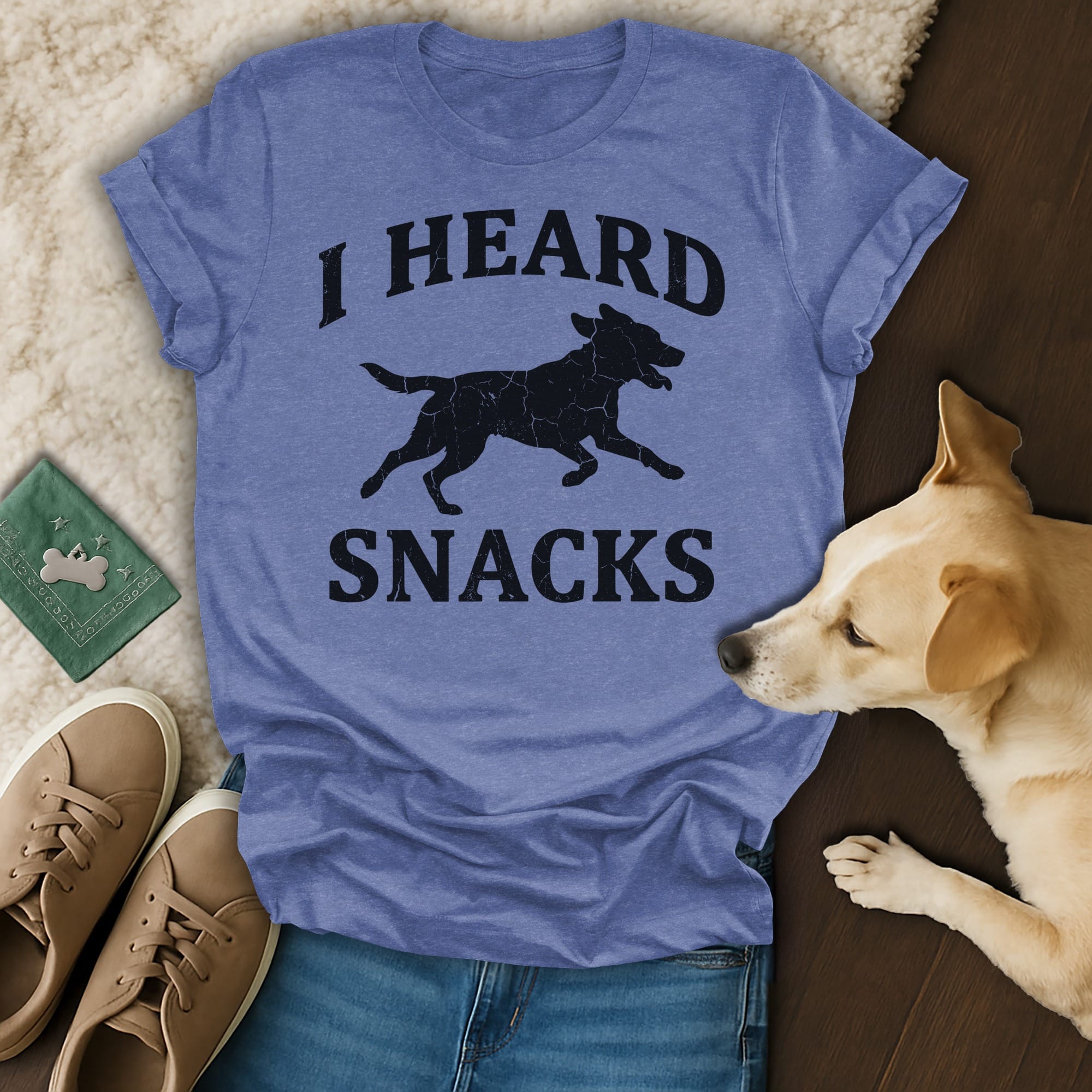 T-shirt with black silhouette of dog and text "I HEARD SNACKS".