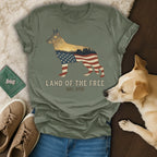 German Shepherd silhouette filled with American flag and patriotic scene, text "Land of the Free".