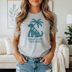 Grey t-shirt with a teal graphic of a dog under a palm tree, text "Island Heart DOG SOUL".