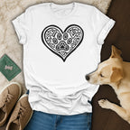 White t-shirt with black heart design filled with paw prints and dog hearts.