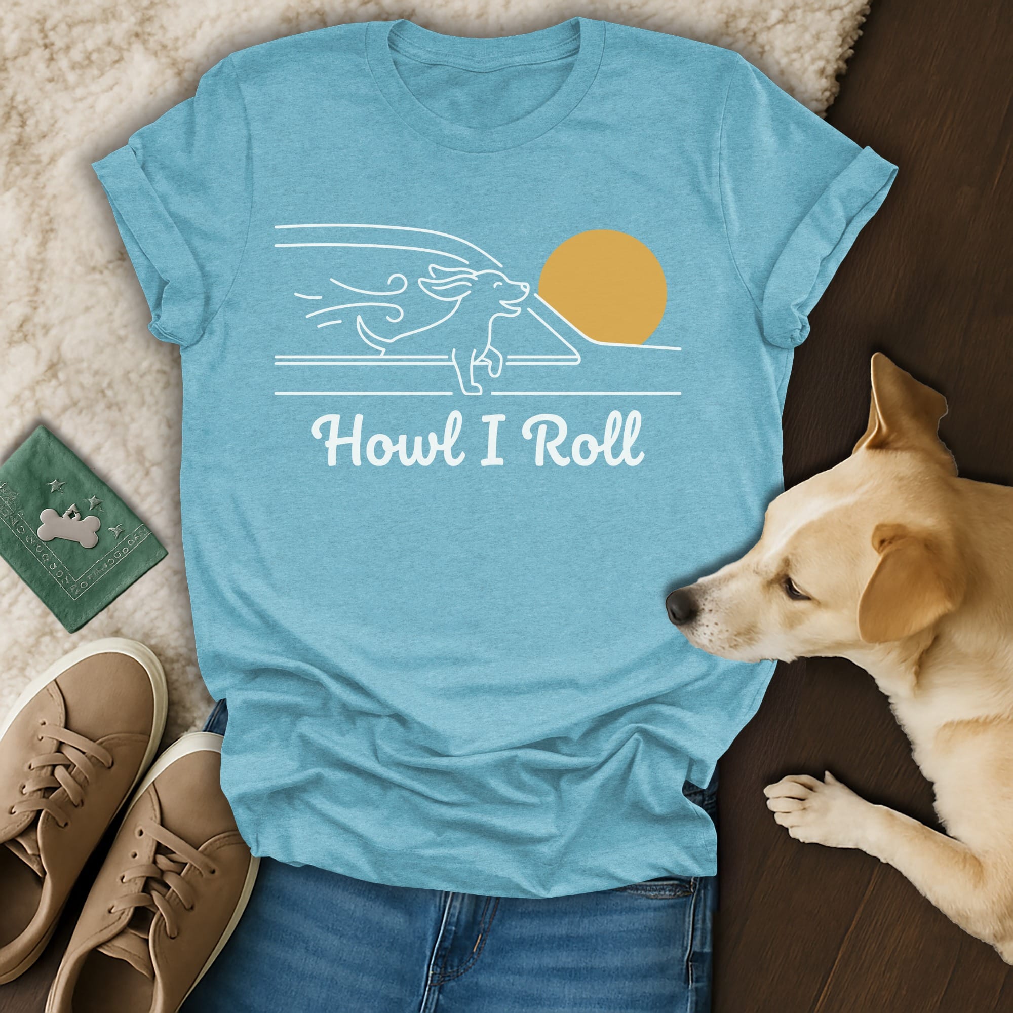 Light blue t-shirt with "Howl I Roll" text and a graphic of a dog running.