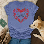 Blue t-shirt with red paw print heart and text "all you need is love and a dog".