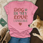 Pink t-shirt with "Dog is my love language" text and heart graphic.