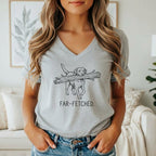 Grey t-shirt with line art of a dog carrying a log and the text "FAR-FETCHED."