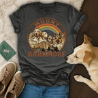 T-shirt featuring dogs with "Mount Barkmore" text and a rainbow.
