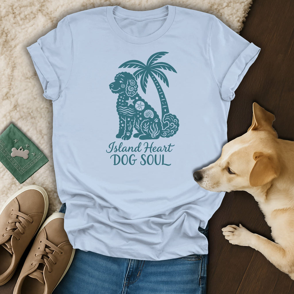 Light blue t-shirt with a teal graphic of a dog and palm tree, reading "Island Heart DOG SOUL".