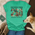 Green t-shirt with "Founding Fidos" and dog-themed Independence Day graphics.