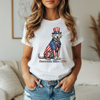 Dog wearing American flag suit and hat, "Pawtriots Since 1776" text.